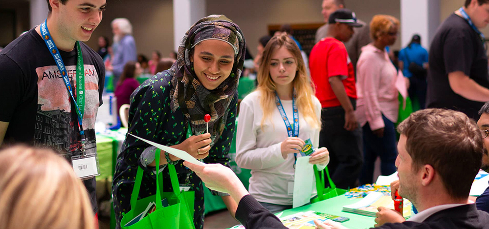Students at campus events table
