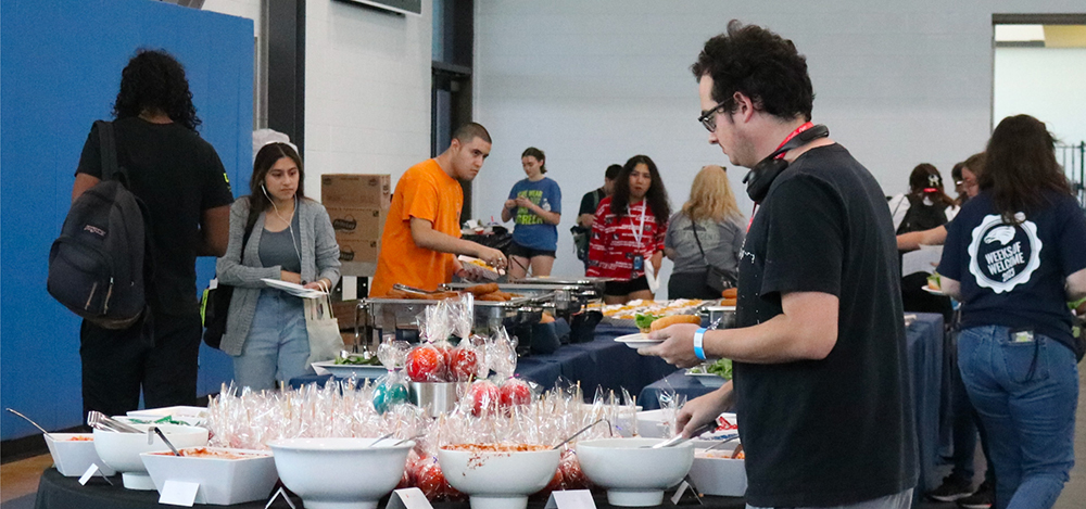 UHCL Students at event table