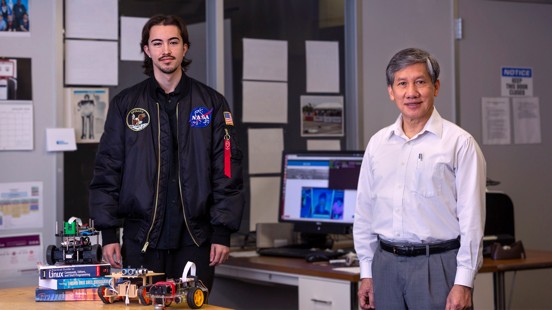 Photo of computer engineering student Justin Tarwater, and Prof. Luong Nguyen